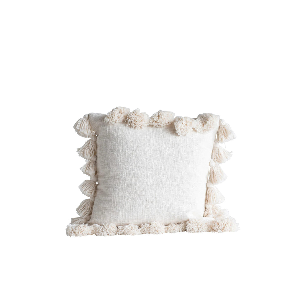 https://www.shoppeapiary.co/cdn/shop/products/WovenCottonCreamThrowPillowwithTassels_APIARY_1024x1024.jpg?v=1645043801